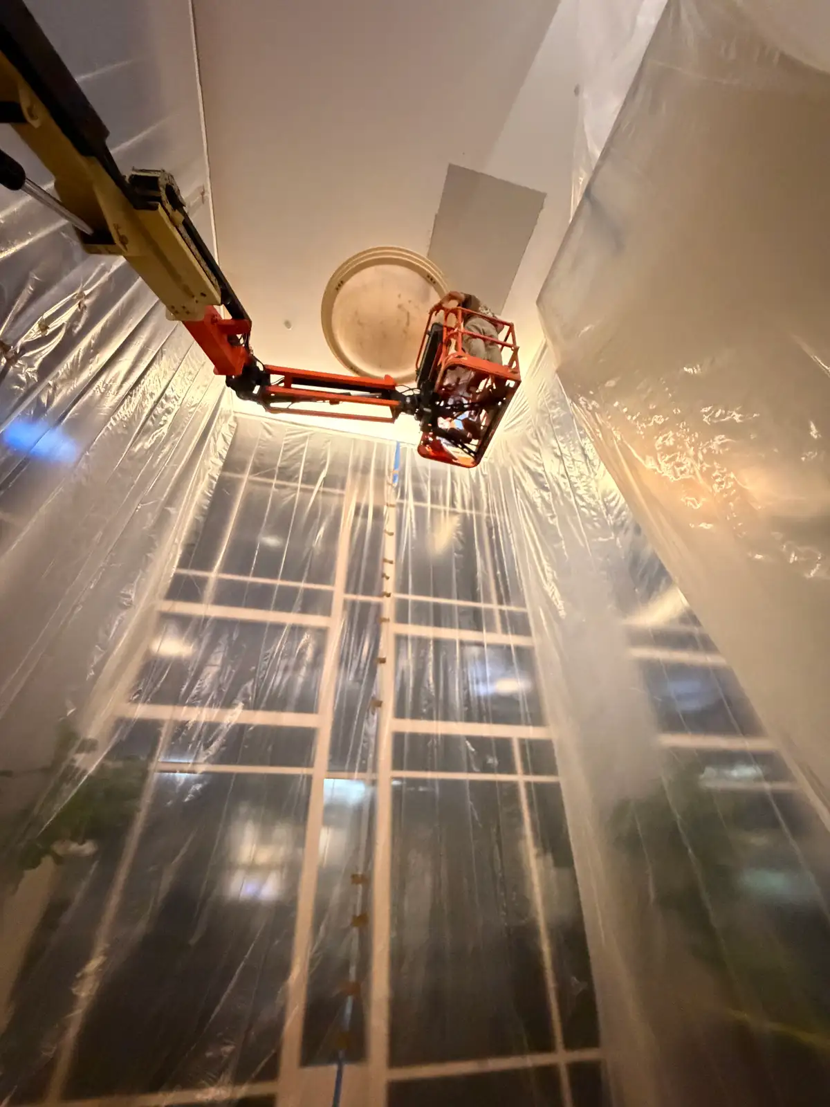 Containment drapes and floor protection set up by Mainline Plumbing during overnight commercial plumbing work at Providence St. Joseph Hospital in Orange