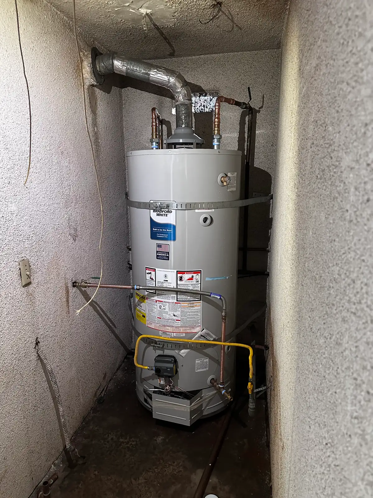 Mainline Plumbing high-efficiency tank water heater install with code-compliant venting and copper connections in a South Bay property